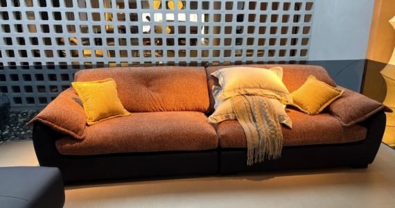 Oversized Rustic Orange Fabric Couch | Maximum Comfort for Showroom Displays